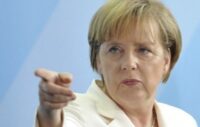 Меркель пригрозила Путіну новими санкціями
